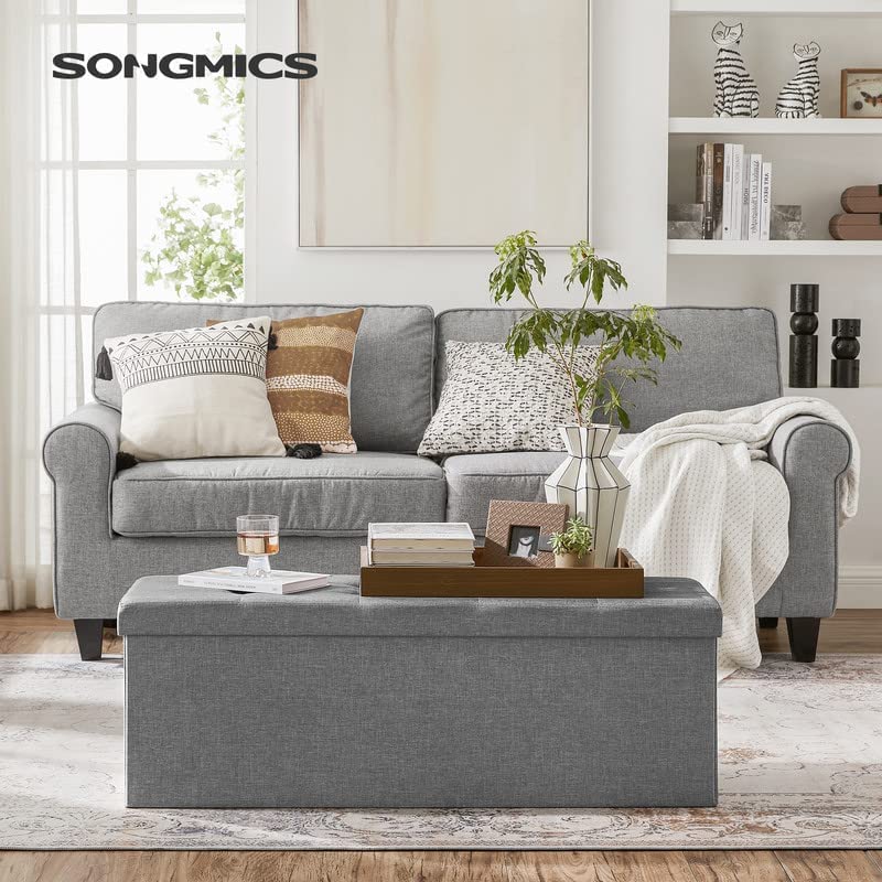 SONGMICS MAZIE Collection - 43 Inches Folding Storage Ottoman Bench, Ottoman Foot Rest, End of Bed Bench, Storage Chest, Load 660 lb, for Living Room, Bedroom, Entryway, Dark Gray ULSF77K