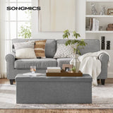SONGMICS MAZIE Collection - 43 Inches Folding Storage Ottoman Bench, Ottoman Foot Rest, End of Bed Bench, Storage Chest, Load 660 lb, for Living Room, Bedroom, Entryway, Dark Gray ULSF77K