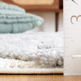 SAFAVIEH Area Rug 8x10 - Moroccan Tassel Shag Collection - Large - Ivory & Brown, Boho Design, Non-Shedding & Easy Cleaning, Plush Pile, Ideal for Living Room, Bedroom, Dining Space (MTS688A)