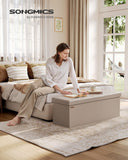 SONGMICS MAZIE Collection - 43 Inches Folding Storage Ottoman Bench, Ottoman with Storage, Foot Rest Stool, Load 660 lb, for Living Room, Synthetic Leather, Black ULSF701