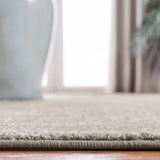 SAFAVIEH Evoke Collection Area Rug - 9' x 12', Ivory & Taupe, Oriental Distressed Design, Non-Shedding & Easy Care, Ideal for High Traffic Areas in Living Room, Bedroom (EVK256E)