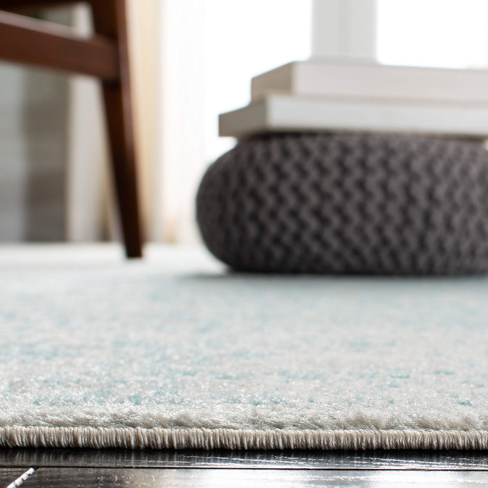 SAFAVIEH Evoke Collection Area Rug - 9' x 12', Ivory & Taupe, Oriental Distressed Design, Non-Shedding & Easy Care, Ideal for High Traffic Areas in Living Room, Bedroom (EVK256E)