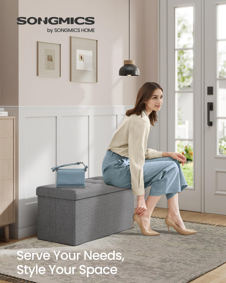 SONGMICS MAZIE Collection - 43 Inches Folding Storage Ottoman Bench, Ottoman Foot Rest, End of Bed Bench, Storage Chest, Load 660 lb, for Living Room, Bedroom, Entryway, Dark Gray ULSF77K