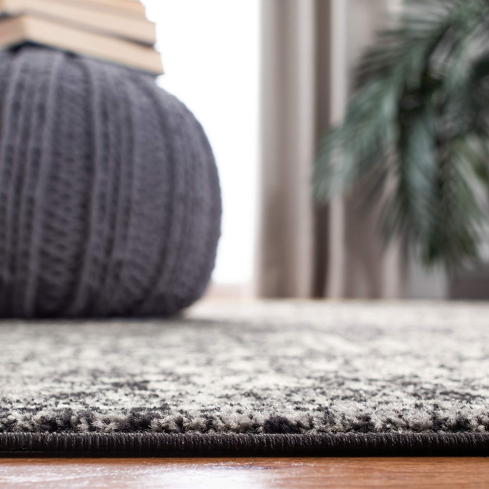 SAFAVIEH Evoke Collection Area Rug - 9' x 12', Ivory & Taupe, Oriental Distressed Design, Non-Shedding & Easy Care, Ideal for High Traffic Areas in Living Room, Bedroom (EVK256E)