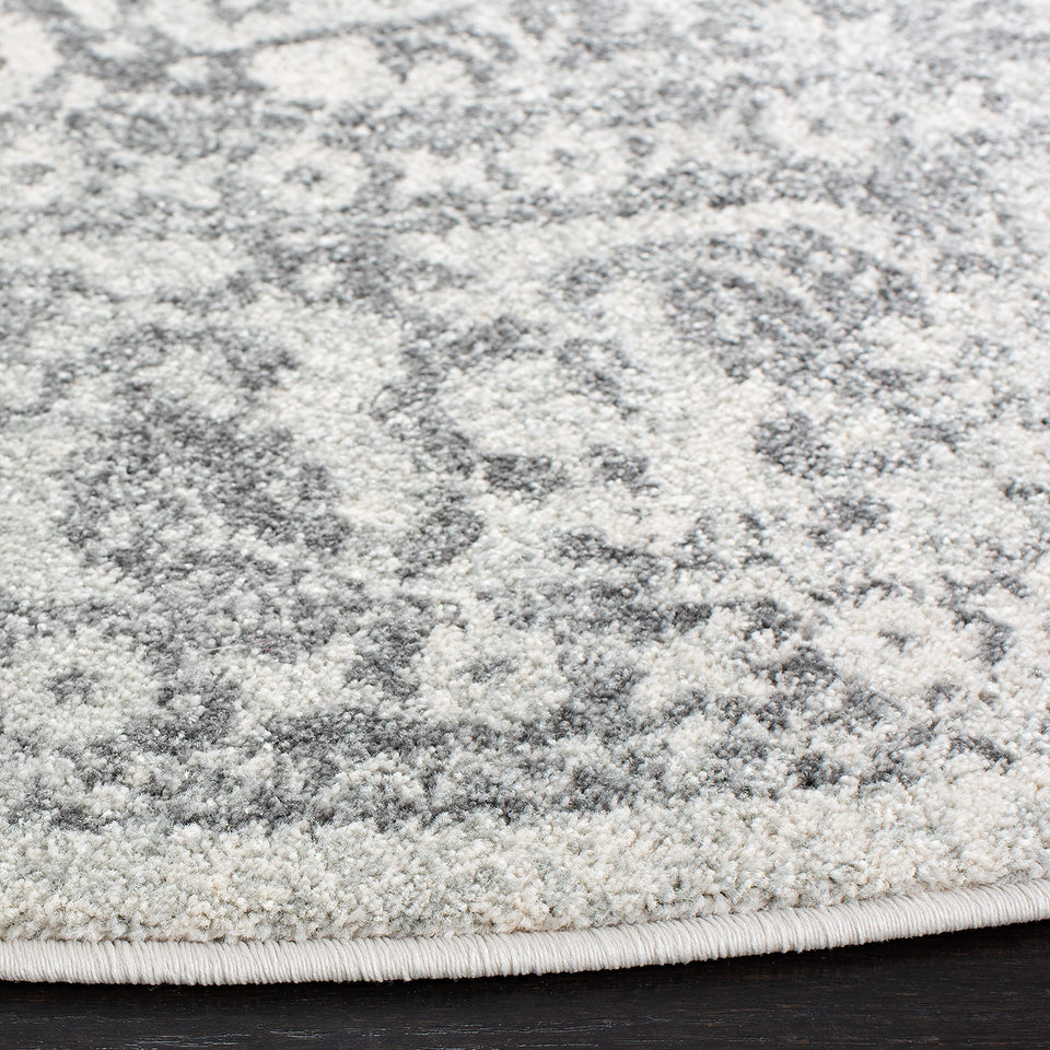 SAFAVIEH Evoke Collection Area Rug - 9' x 12', Ivory & Taupe, Oriental Distressed Design, Non-Shedding & Easy Care, Ideal for High Traffic Areas in Living Room, Bedroom (EVK256E)