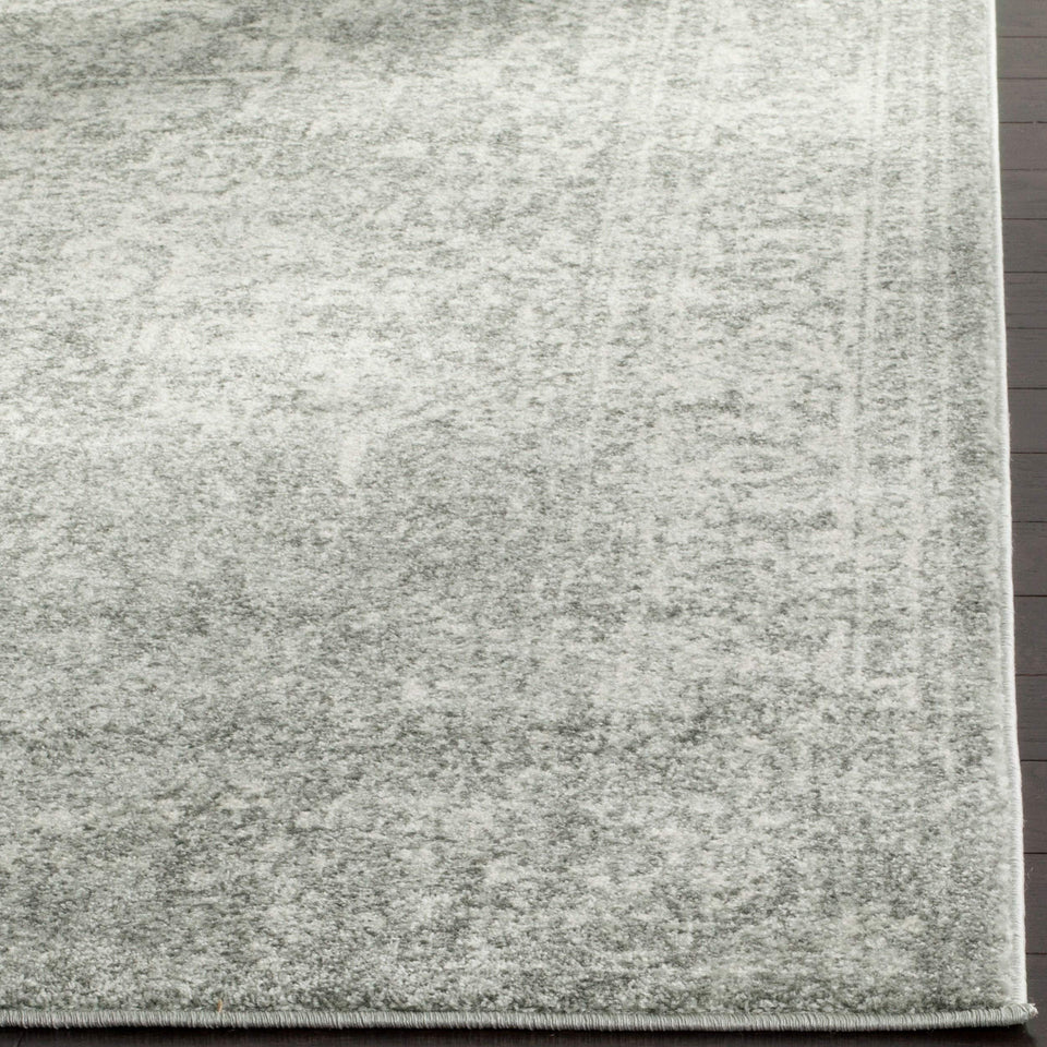 SAFAVIEH Evoke Collection Area Rug - 9' x 12', Ivory & Taupe, Oriental Distressed Design, Non-Shedding & Easy Care, Ideal for High Traffic Areas in Living Room, Bedroom (EVK256E)