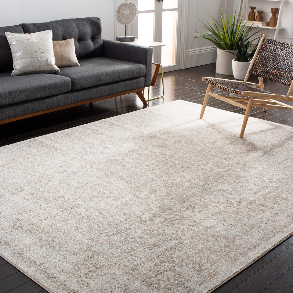 SAFAVIEH Evoke Collection Area Rug - 9' x 12', Ivory & Taupe, Oriental Distressed Design, Non-Shedding & Easy Care, Ideal for High Traffic Areas in Living Room, Bedroom (EVK256E)