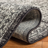 SAFAVIEH Evoke Collection Area Rug - 9' x 12', Ivory & Taupe, Oriental Distressed Design, Non-Shedding & Easy Care, Ideal for High Traffic Areas in Living Room, Bedroom (EVK256E)